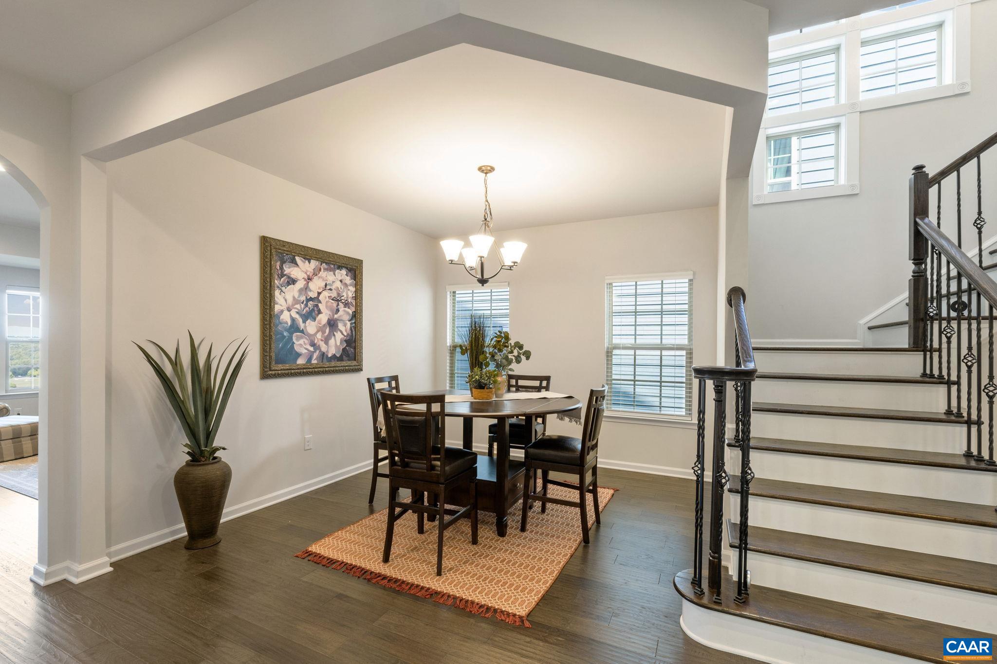 1516 Delphi Lane Charlottesville, VA 22911 - Photo 22 of 74 a view of a a dining room with furniture window and wooden floor