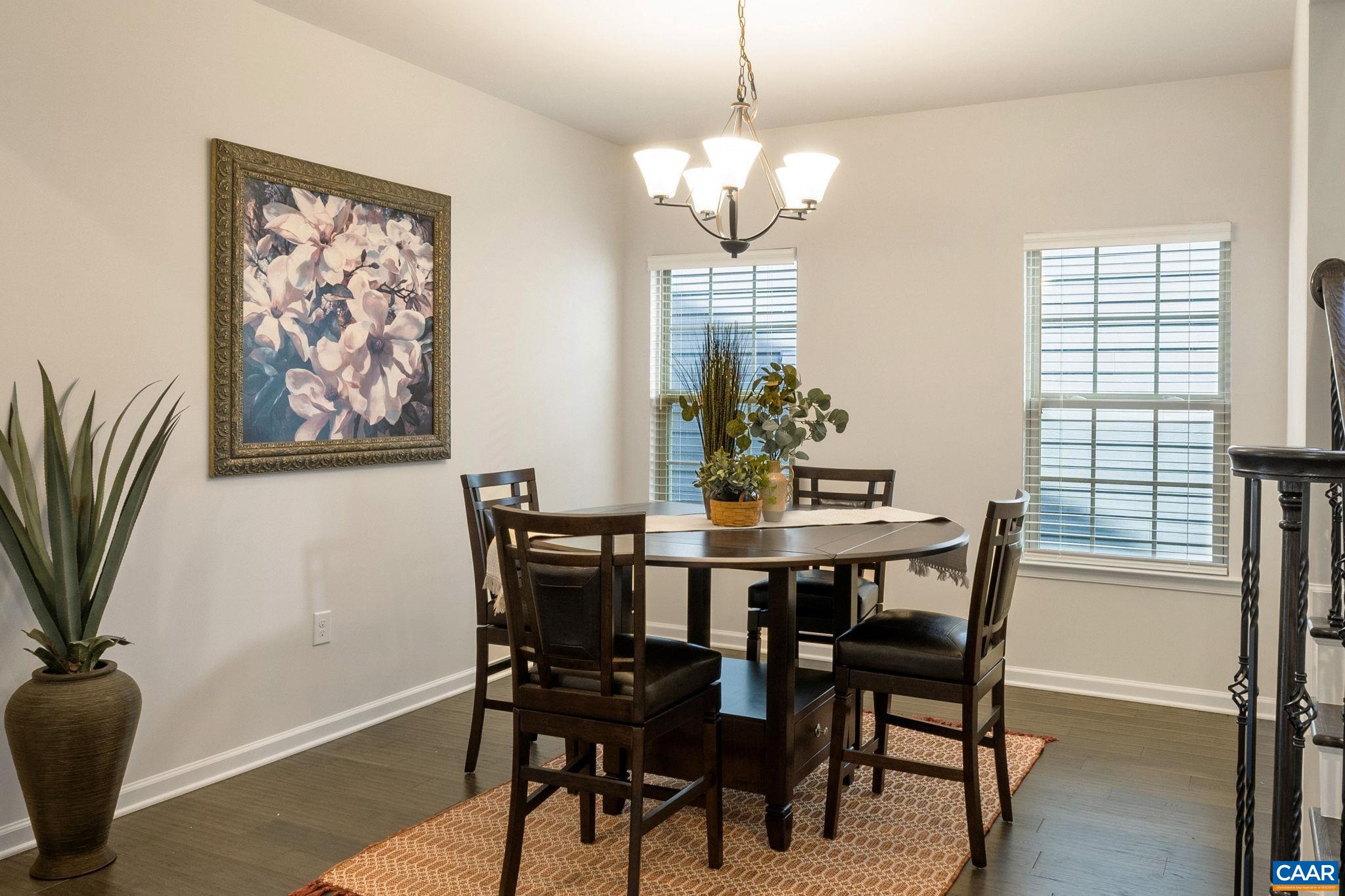 1516 Delphi Lane Charlottesville, VA 22911 - Photo 23 of 74 a view of a dining room with furniture window and wooden floor