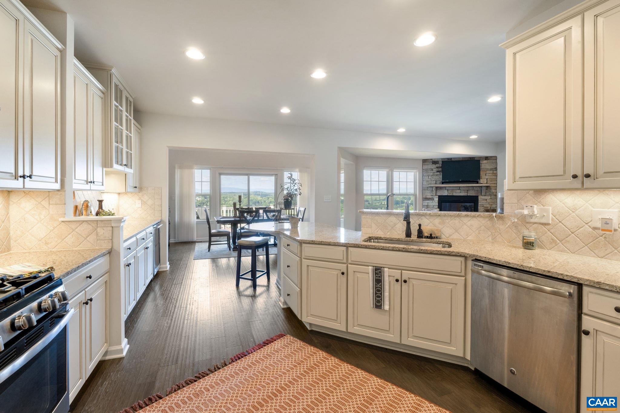 1516 Delphi Lane Charlottesville, VA 22911 - Photo 35 of 74 a kitchen with lots of counter top space and dining table