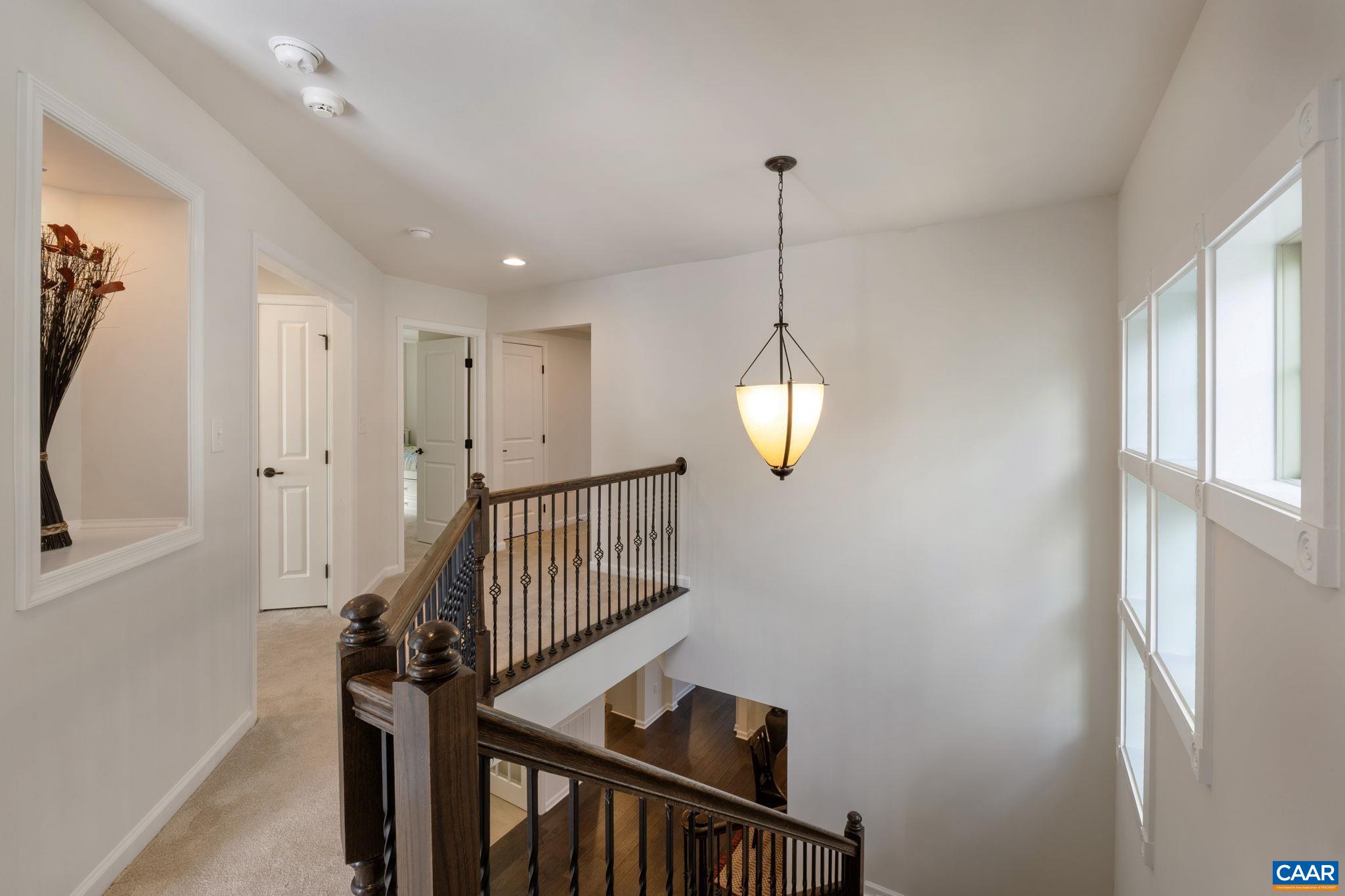 1516 Delphi Lane Charlottesville, VA 22911 - Photo 38 of 74 a view of a hallway with windows