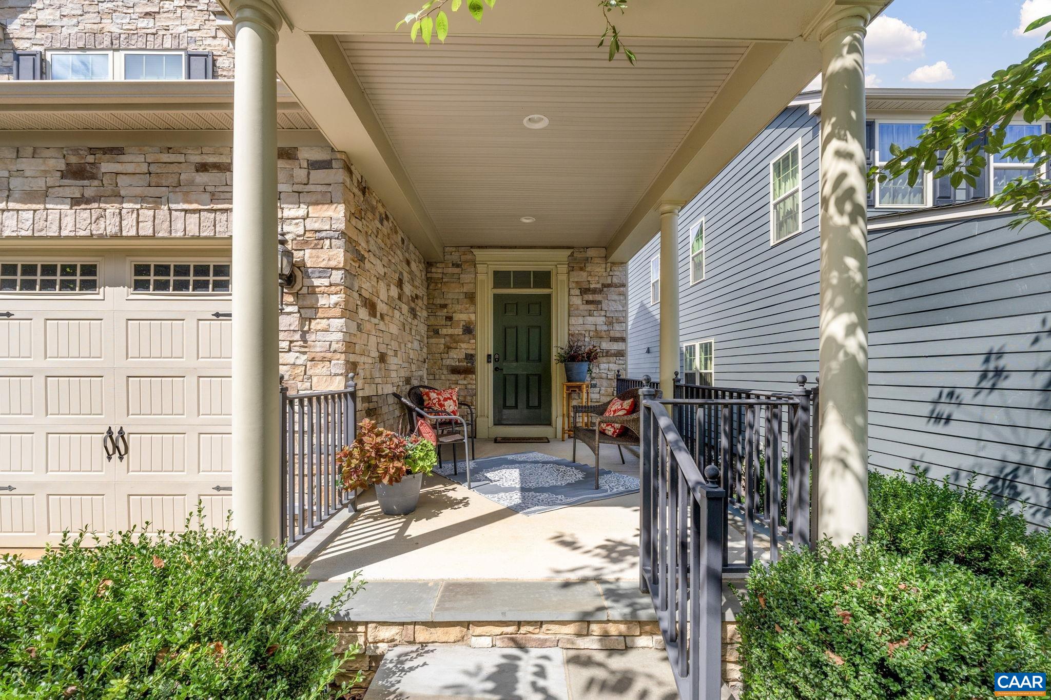 1516 Delphi Lane Charlottesville, VA 22911 - Photo 4 of 74 a view of a patio with table and chairs and potted plants