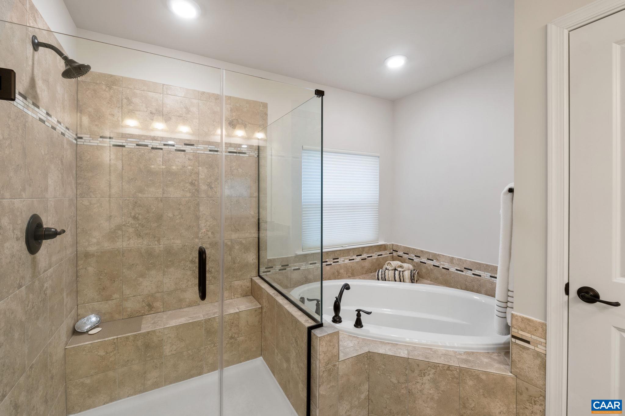 1516 Delphi Lane Charlottesville, VA 22911 - Photo 43 of 74 a bathroom with a bathtub and a shower