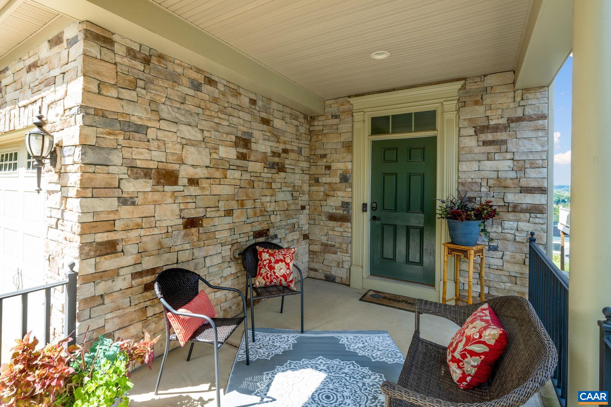 1516 Delphi Lane Charlottesville, VA 22911 - Photo 6 of 74 a living room with furniture a rug and a fireplace