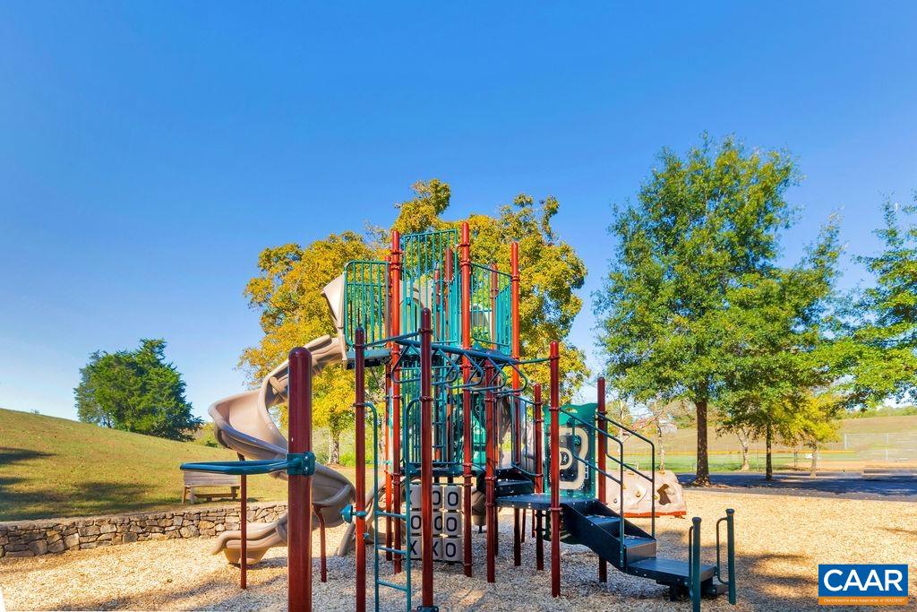 1516 Delphi Lane Charlottesville, VA 22911 - Photo 70 of 74 a view of a swimming pool with a table and chairs