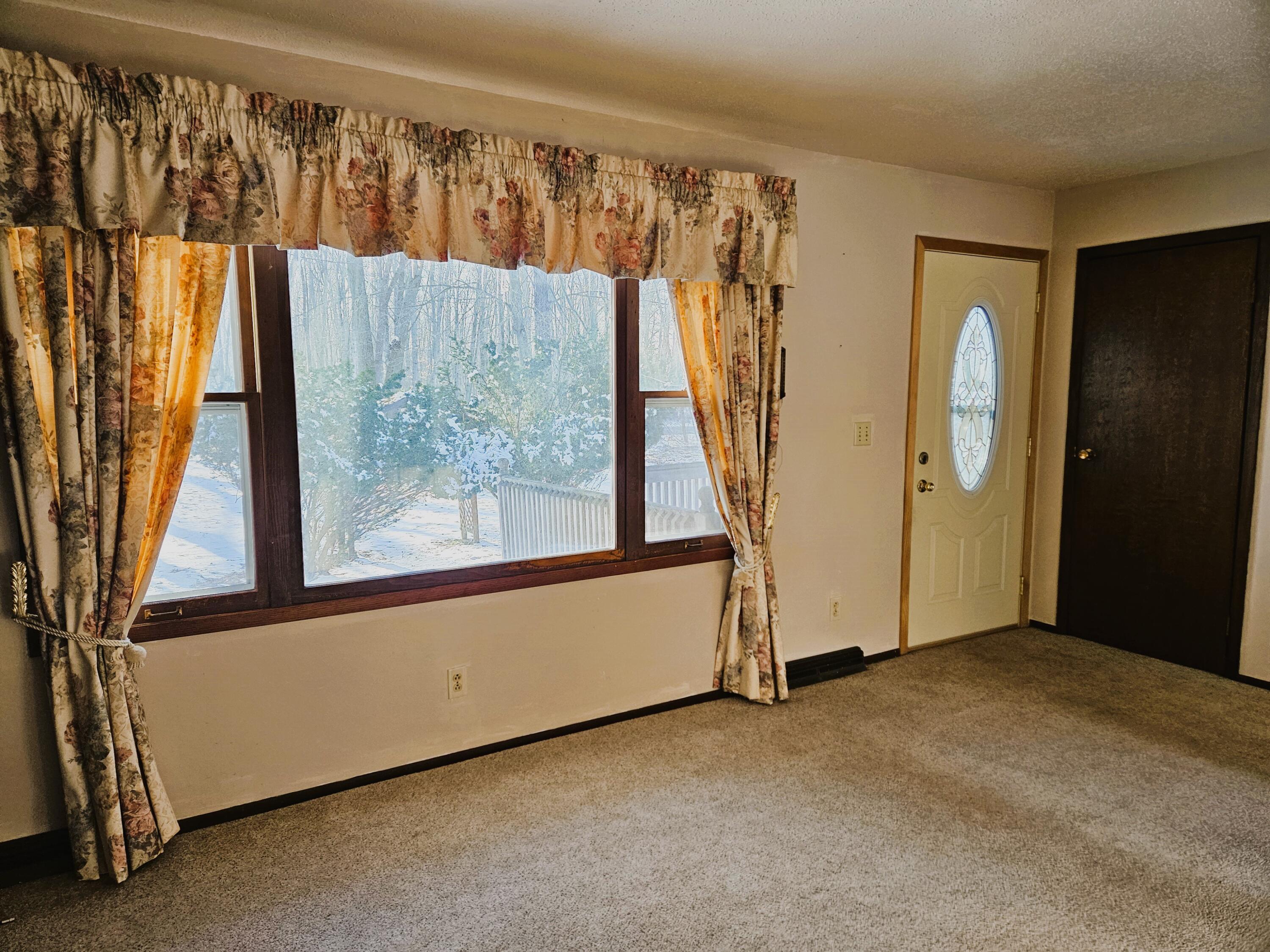 9178 Lamos Road Montague, MI 49437 - Photo 15 of 42 Living Room 3