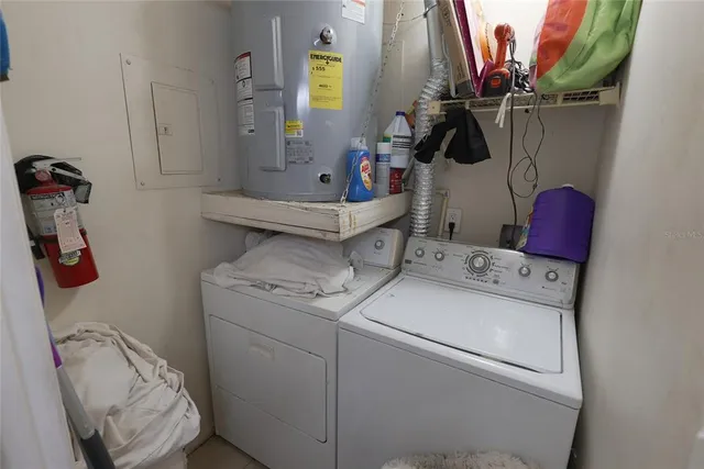 a utility room with dryer and washer
