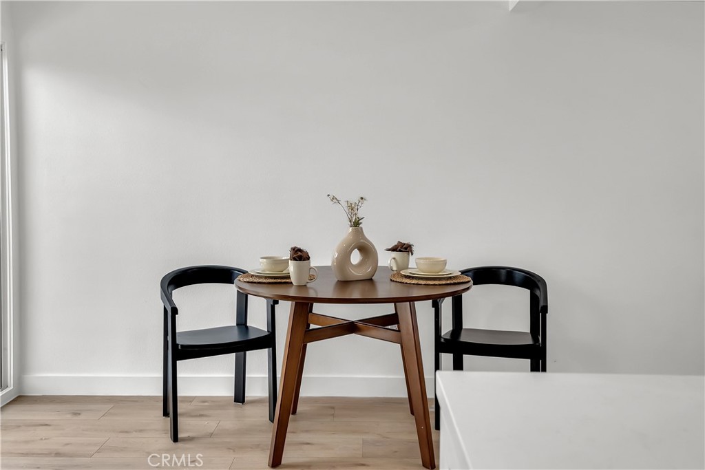 16766 Sam Gerry Drive La Puente, CA 91744 - Photo 17 of 31 a view of a workspace room with furniture and wooden floor