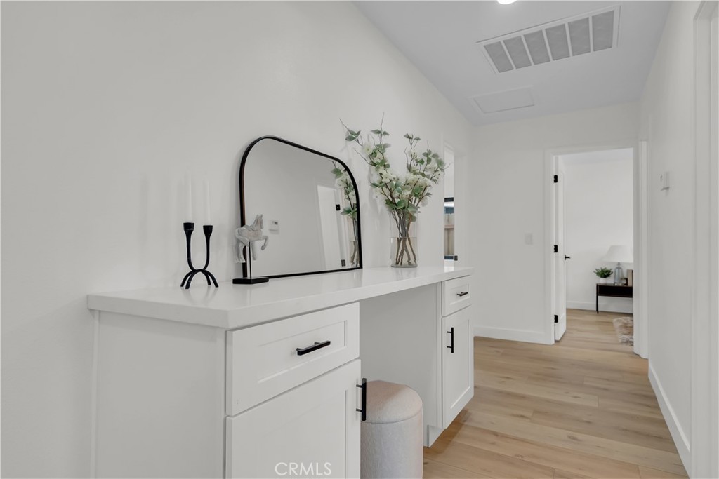 16766 Sam Gerry Drive La Puente, CA 91744 - Photo 18 of 31 a view of cabinets and wooden floor