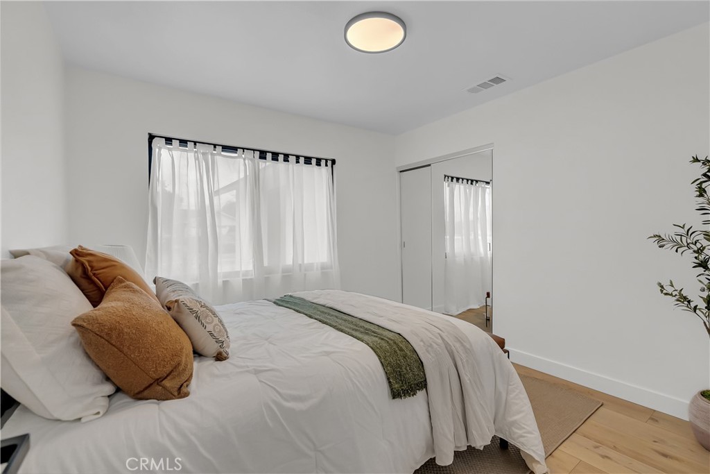 16766 Sam Gerry Drive La Puente, CA 91744 - Photo 20 of 31 a bedroom with a bed and a window