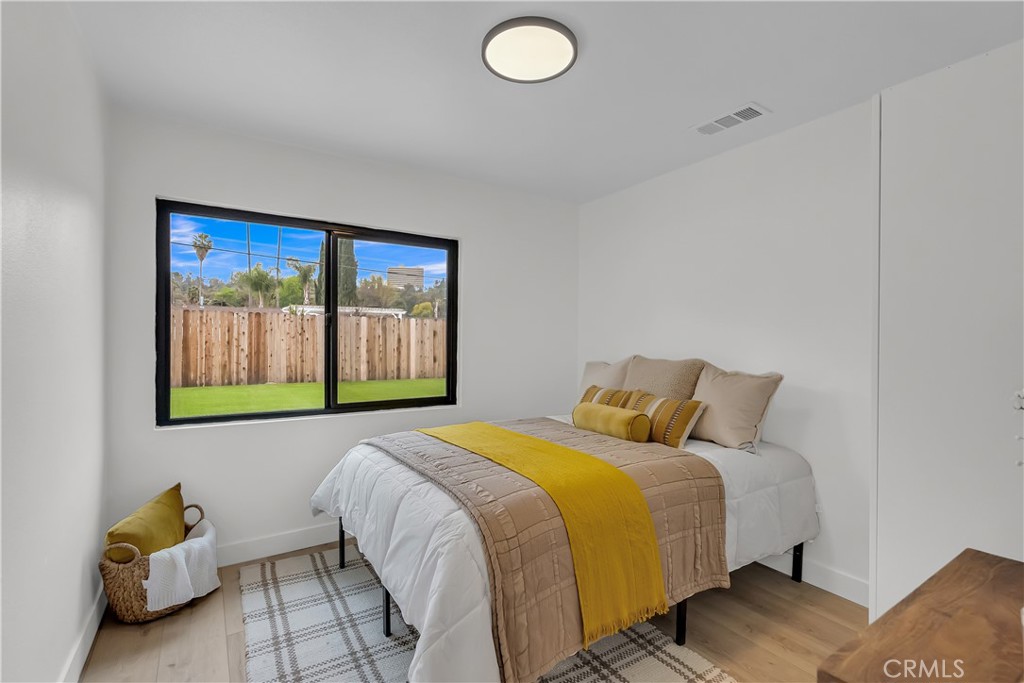 16766 Sam Gerry Drive La Puente, CA 91744 - Photo 21 of 31 a bedroom with a bed and a window