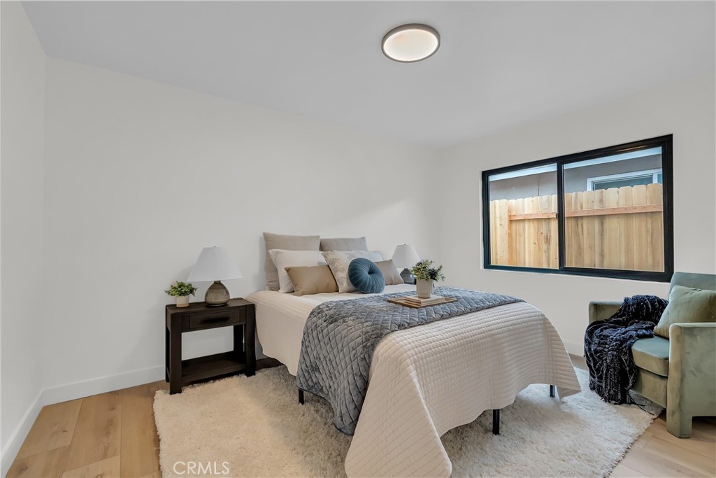 16766 Sam Gerry Drive La Puente, CA 91744 - Photo 23 of 31 a bedroom with a bed and a window