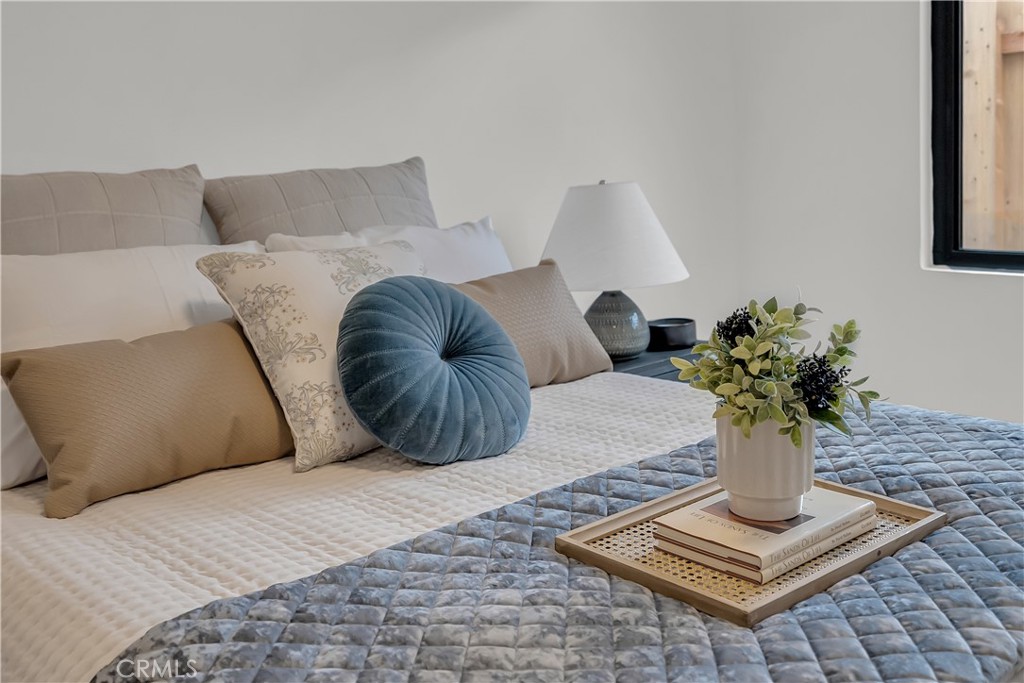 16766 Sam Gerry Drive La Puente, CA 91744 - Photo 24 of 31 a bed sitting in a bedroom and with couch