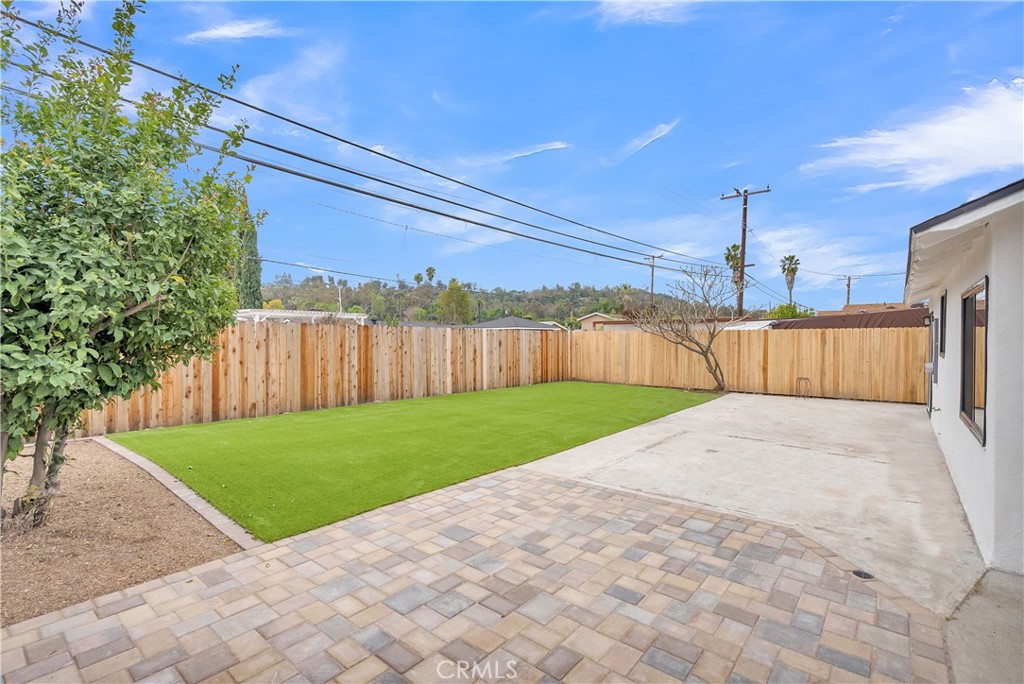 16766 Sam Gerry Drive La Puente, CA 91744 - Photo 30 of 31 a view of a backyard with wooden fence