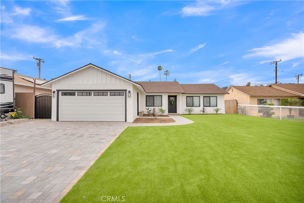 16766 Sam Gerry Drive La Puente, CA 91744 - Photo 3 of 31 a front view of a house with yard patio and green space