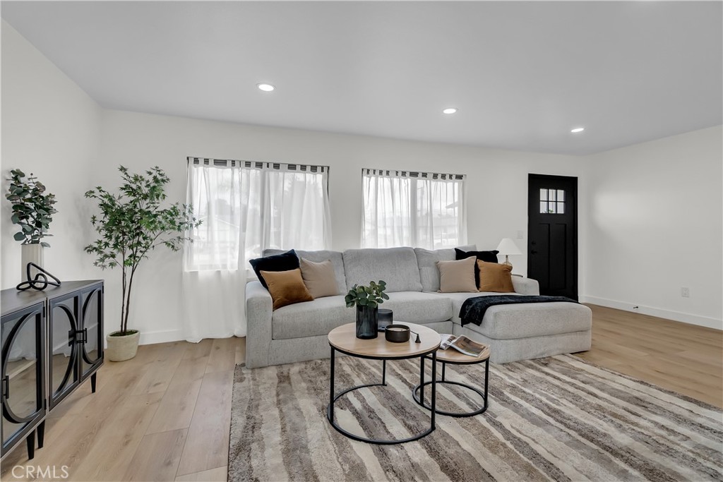 16766 Sam Gerry Drive La Puente, CA 91744 - Photo 8 of 31 a living room with furniture and a potted plant