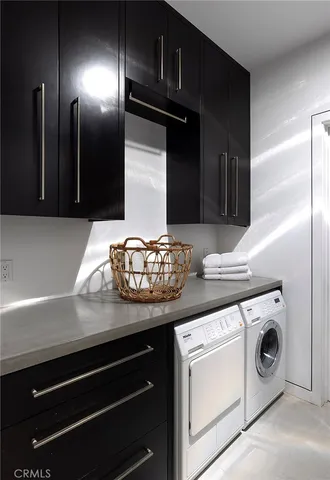 a kitchen with a stove and a refrigerator