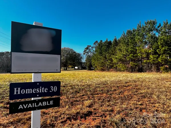 a view of outdoor space with sign board