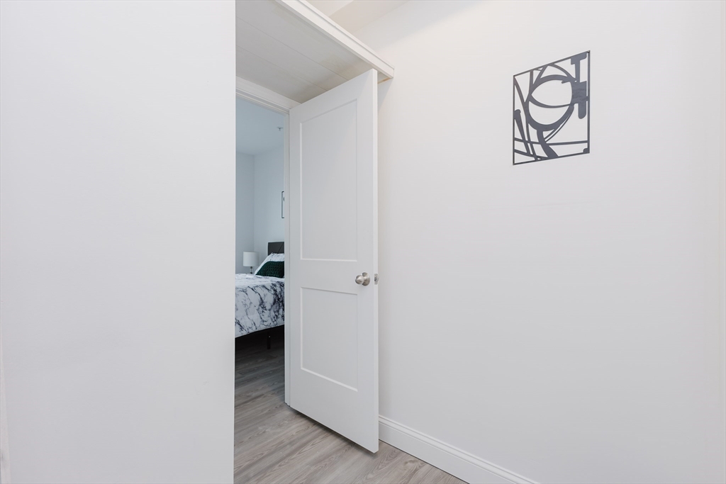 92-94 George Street, Unit 202 Boston, MA 02119 - Photo 34 of 42 a room that has a window in it