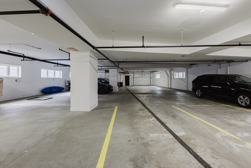 92-94 George Street, Unit 202 Boston, MA 02119 - Photo 41 of 42 a view of a car garage