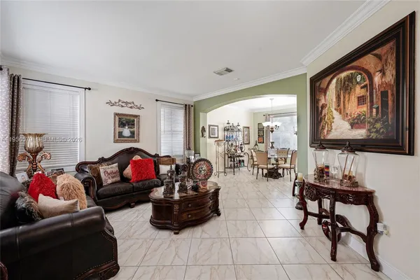 a living room with furniture and a window