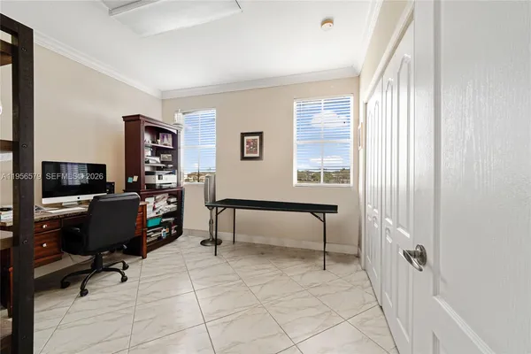 a view of front door with wooden door