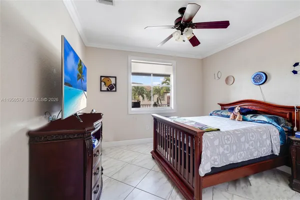 a bathroom with a sink vanity mirror and toilet