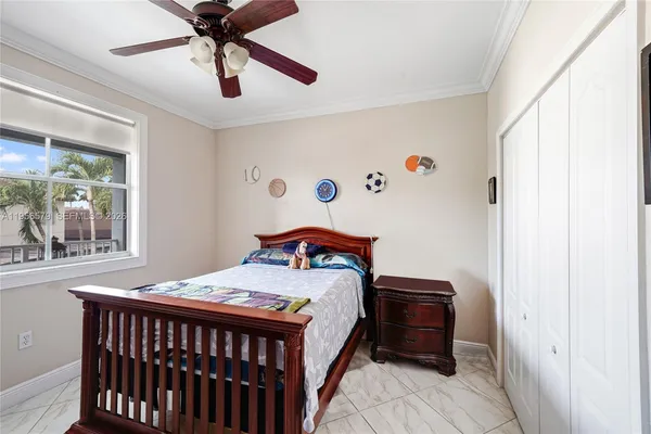 a bathroom with a double vanity sink mirror and shower