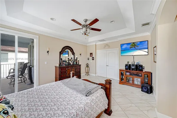 a view of a backyard with sitting area