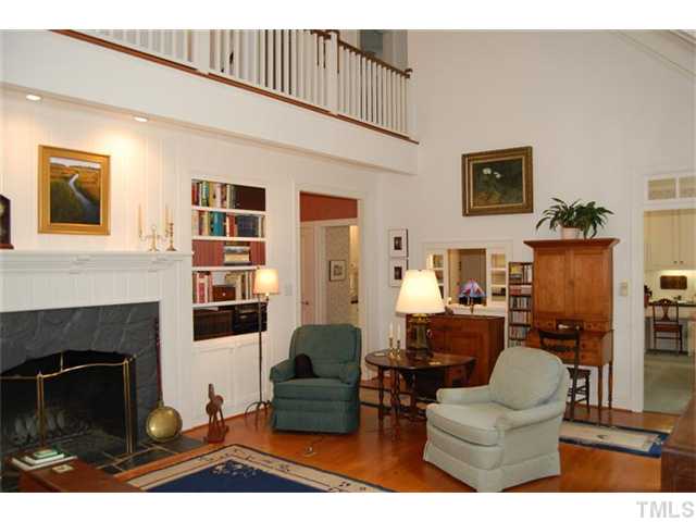 Beamed vaulted ceiling accented by dramatic balcony. Totally wonderful bright and open great room.