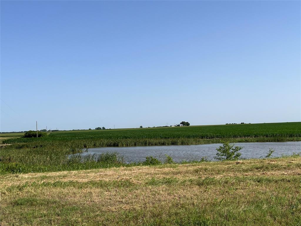 674 State Highway 171 Hubbard, TX 76648 - Photo 18 of 23 a view of a lake with houses in background