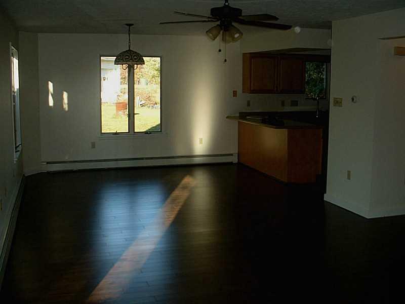 1751 Mulberry Road Cherry Tree, PA 15724 - Photo 2 of 9 Den/Family/Great Room. New Floating Floor in Spacious Family Room with Fireplace