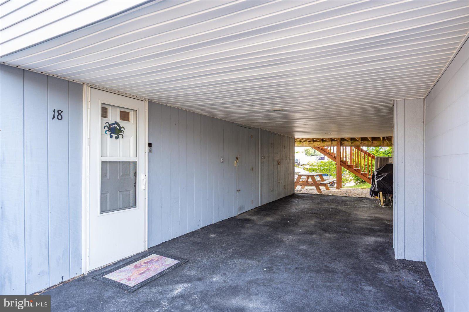722 Anchor Chain Road, Unit 18B Ocean City, MD 21842 - Photo 32 of 35 Additional Storage Closet and parking