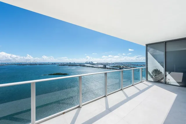 a view of balcony with furniture
