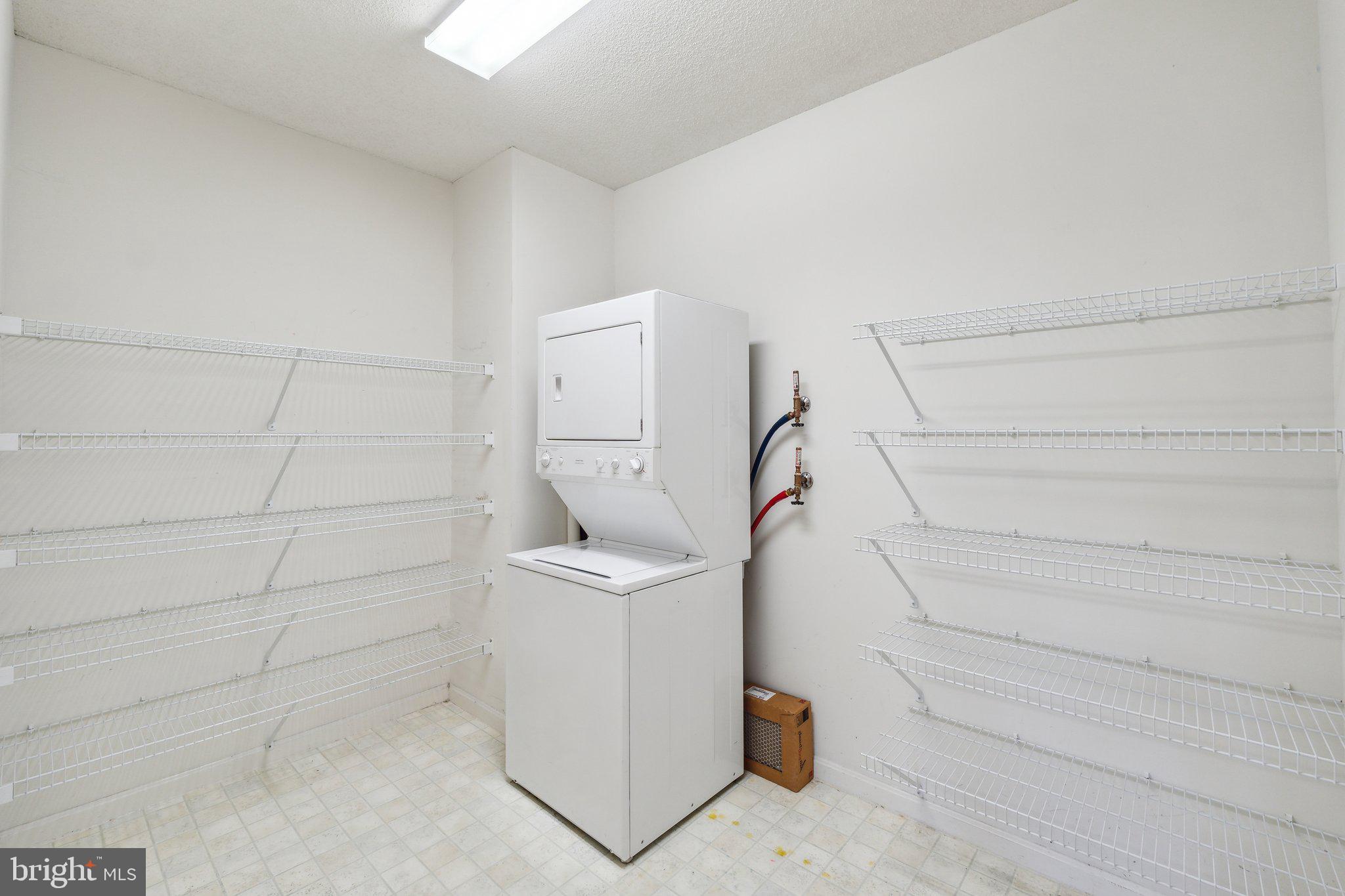 3200 North Leisure World Boulevard, Unit 115 Silver Spring, MD 20906 - Photo 15 of 28 a bathroom with a sink and shower
