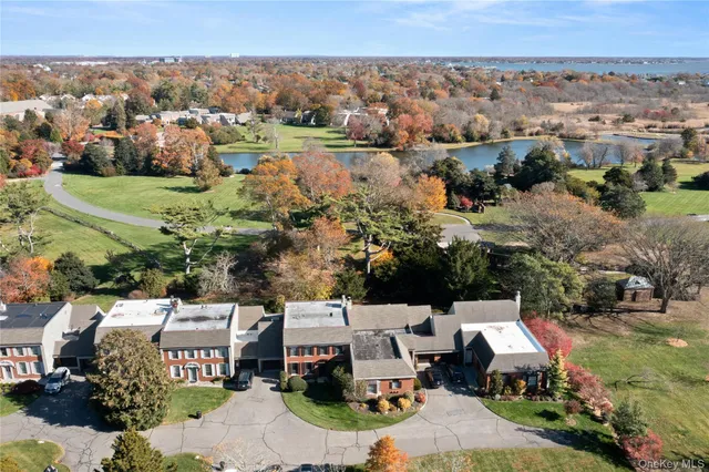 an aerial view of a house with a garden