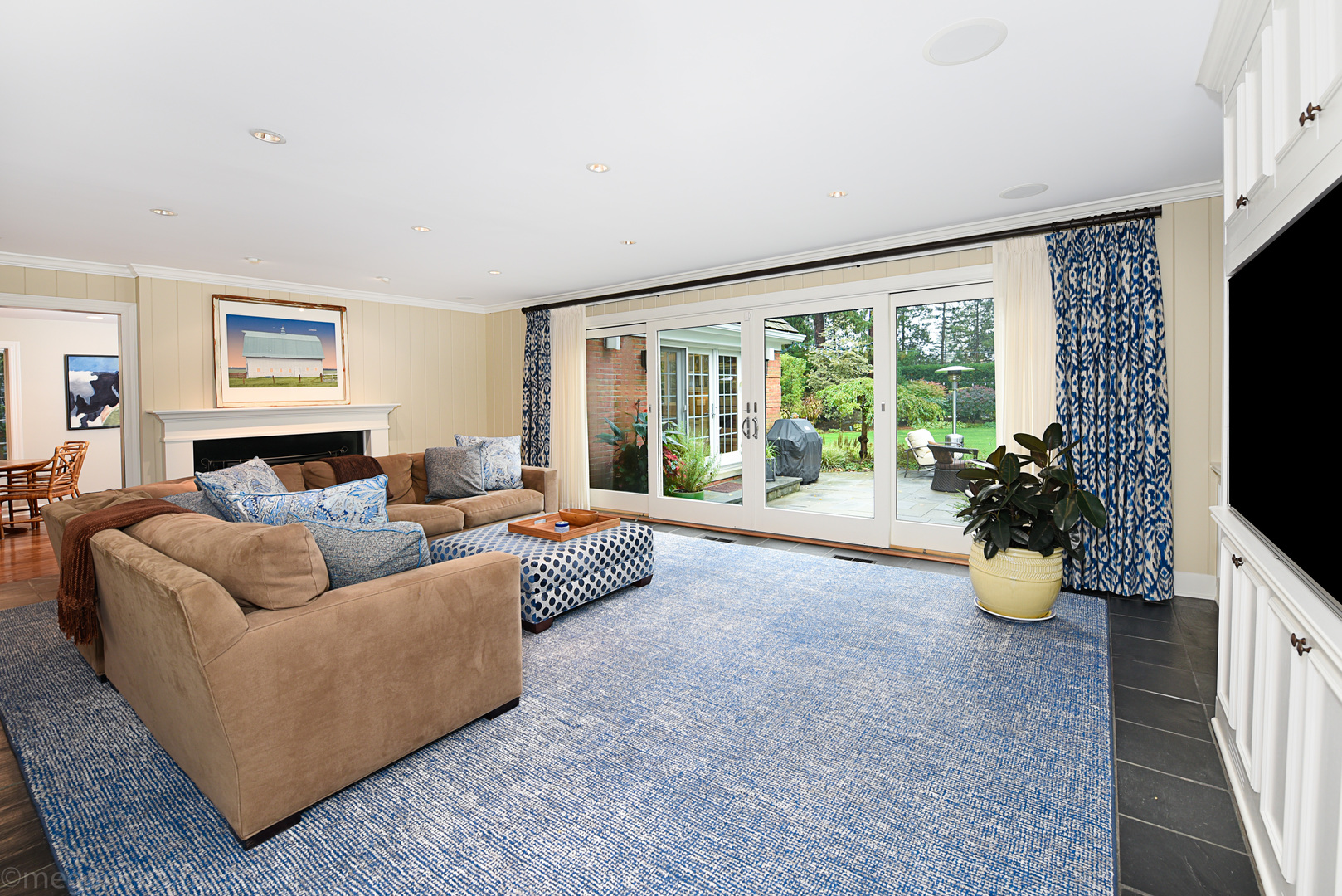 1115 Mohawk Road Wilmette, IL 60091 - Photo 11 of 66 a living room with furniture and a flat screen tv