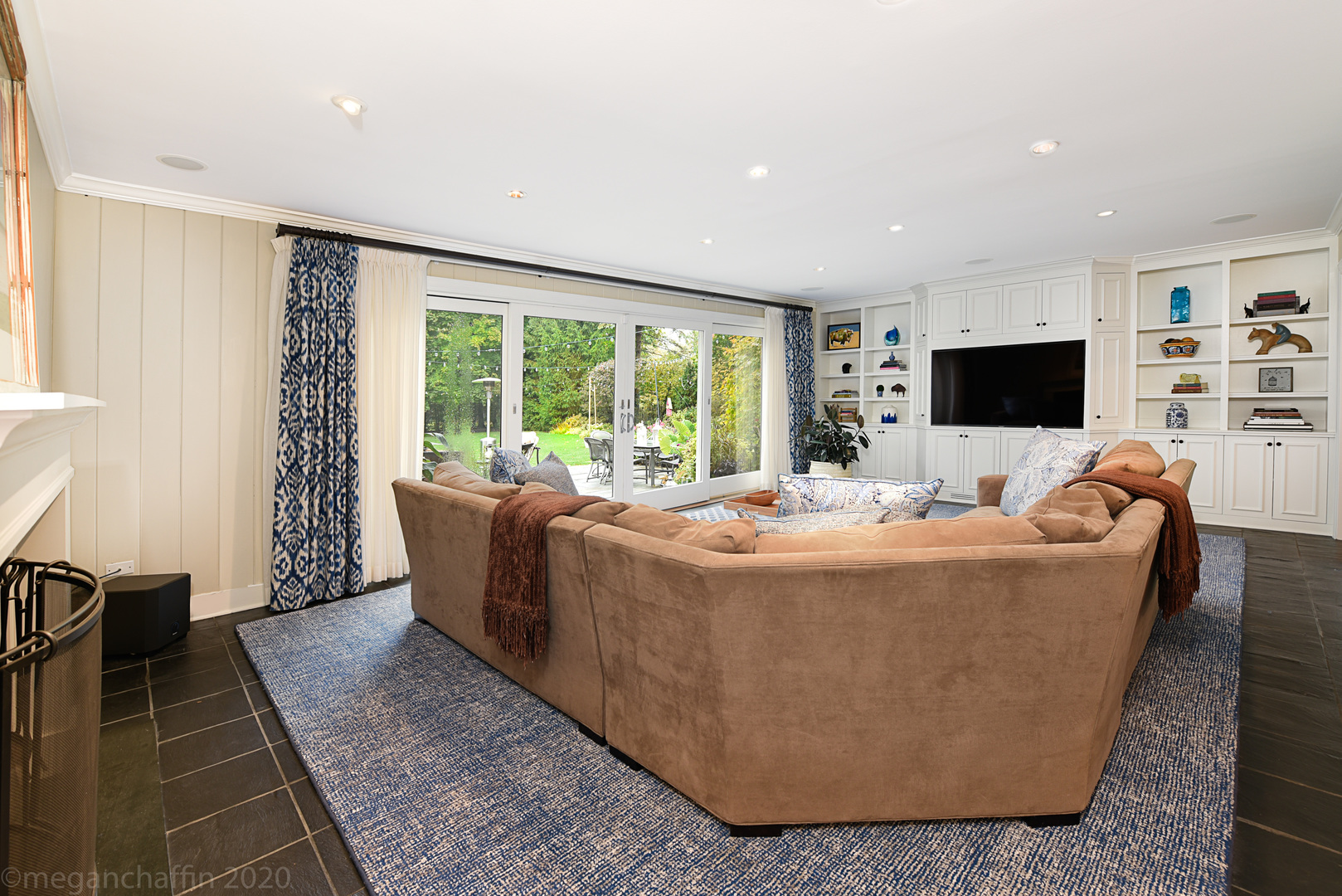 1115 Mohawk Road Wilmette, IL 60091 - Photo 13 of 66 a living room with large window and a flat screen tv