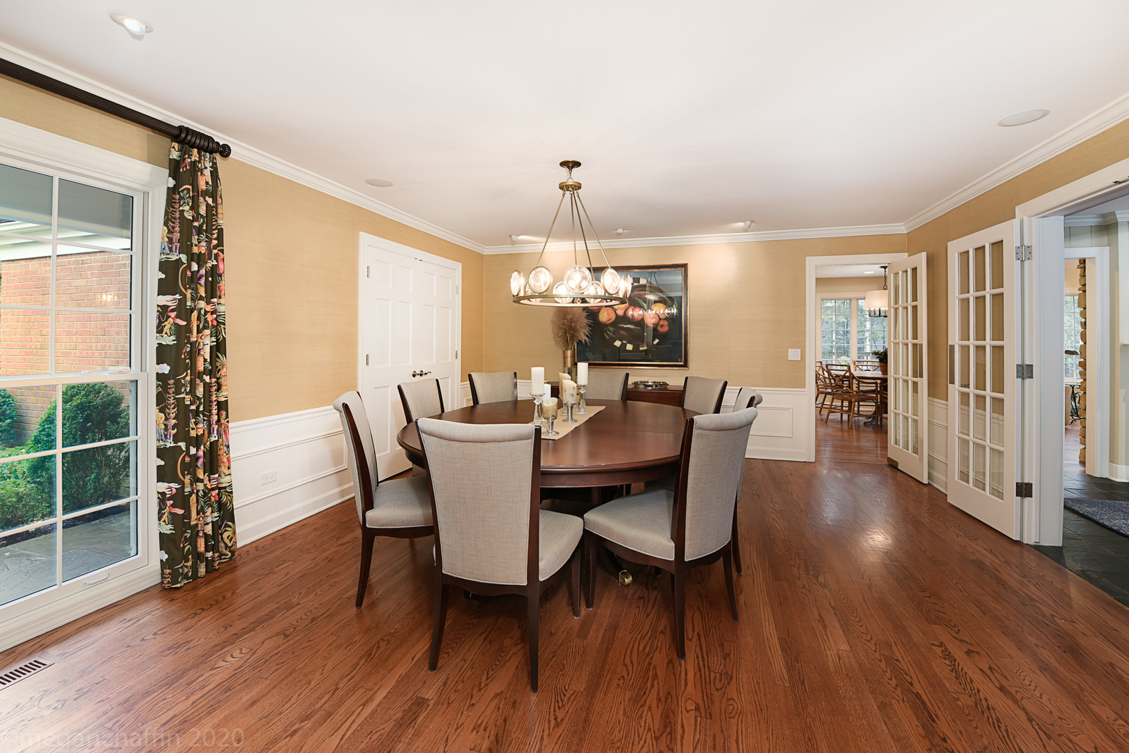 1115 Mohawk Road Wilmette, IL 60091 - Photo 16 of 66 a view of a dining room with furniture window and wooden floor