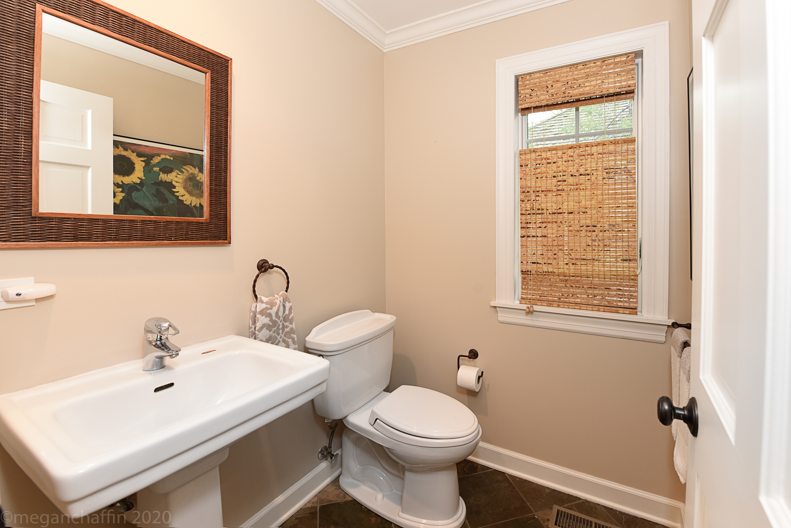 1115 Mohawk Road Wilmette, IL 60091 - Photo 24 of 66 a bathroom with a toilet a sink and a mirror