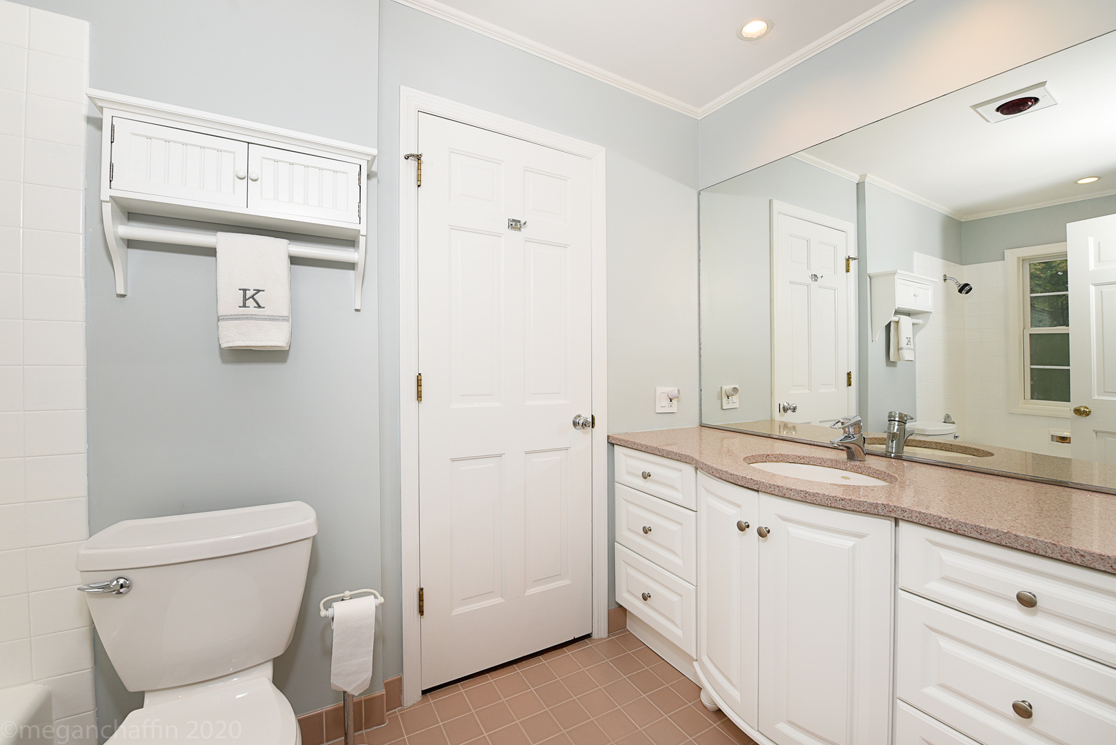 1115 Mohawk Road Wilmette, IL 60091 - Photo 31 of 66 a bathroom with a granite countertop sink toilet and shower