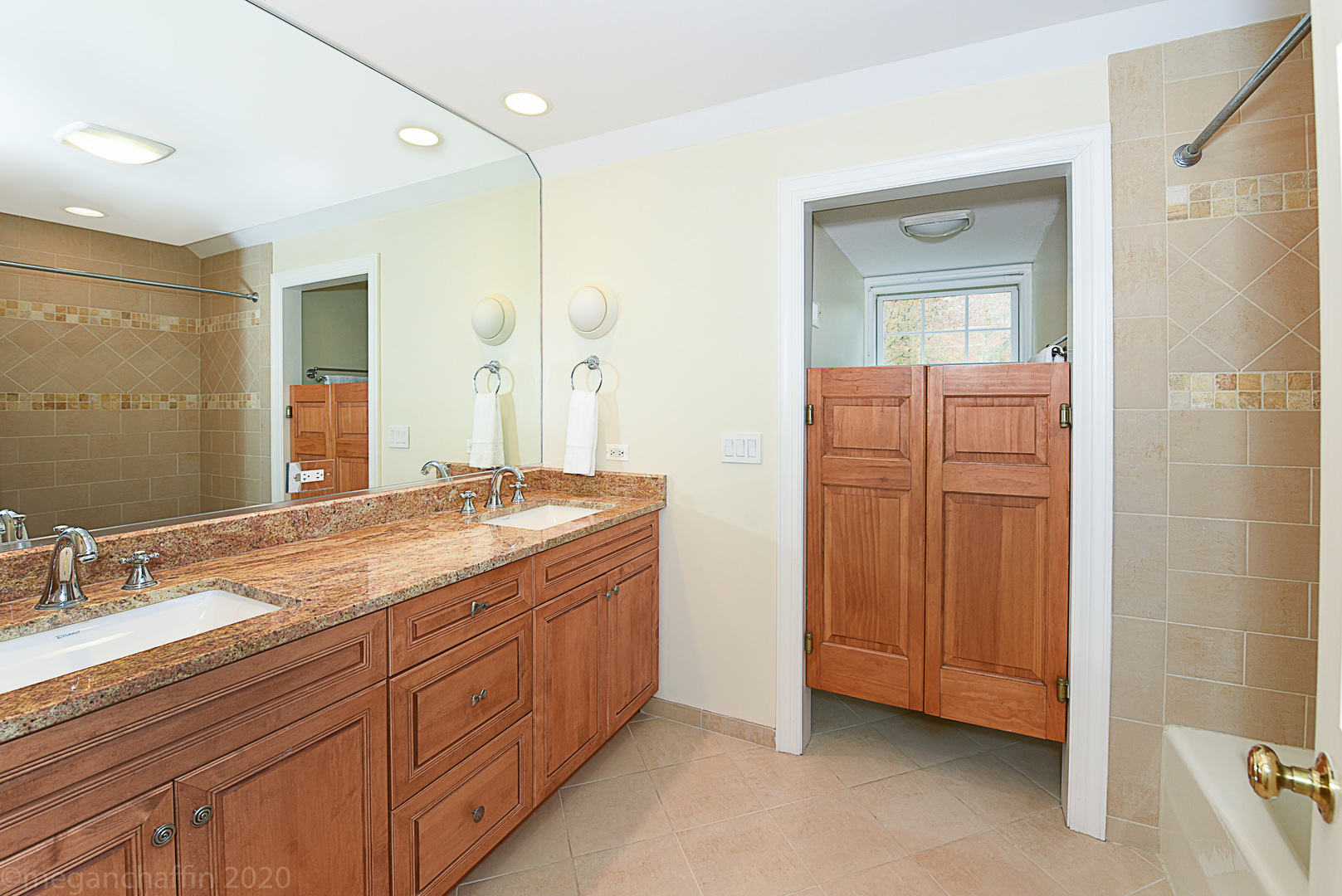 1115 Mohawk Road Wilmette, IL 60091 - Photo 35 of 66 a bathroom with a granite countertop sink mirror and
