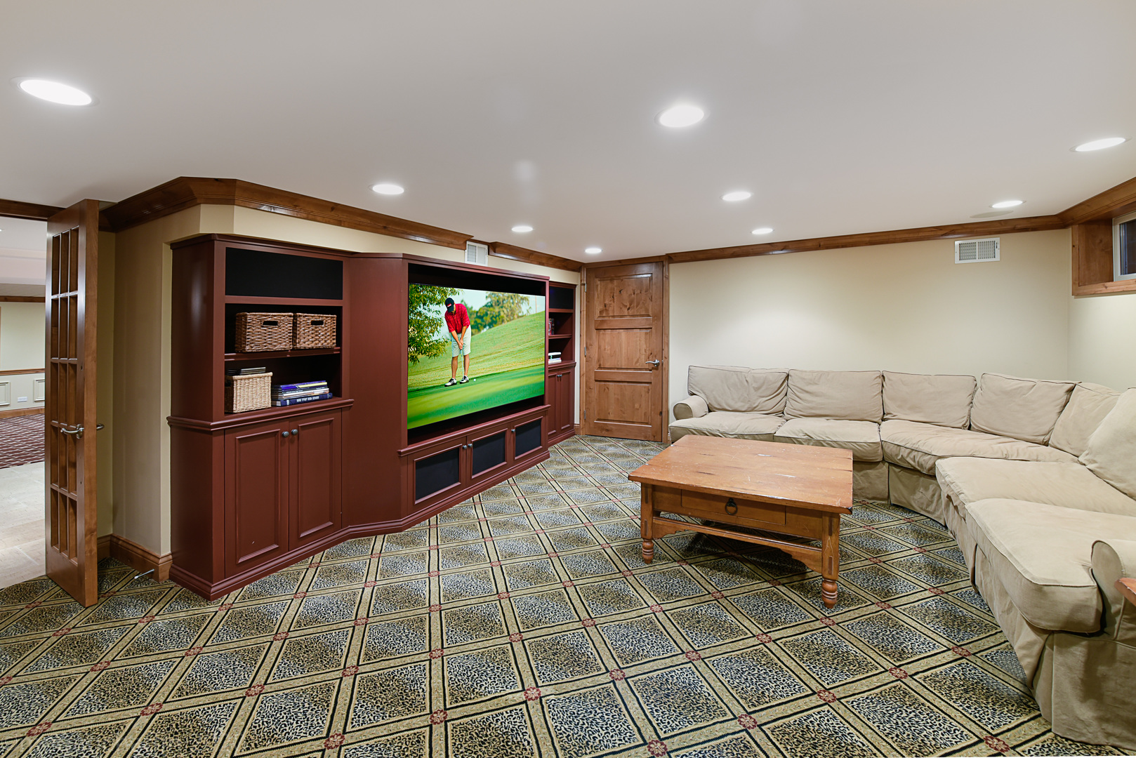 1115 Mohawk Road Wilmette, IL 60091 - Photo 48 of 66 a living room with couch and a flat screen tv