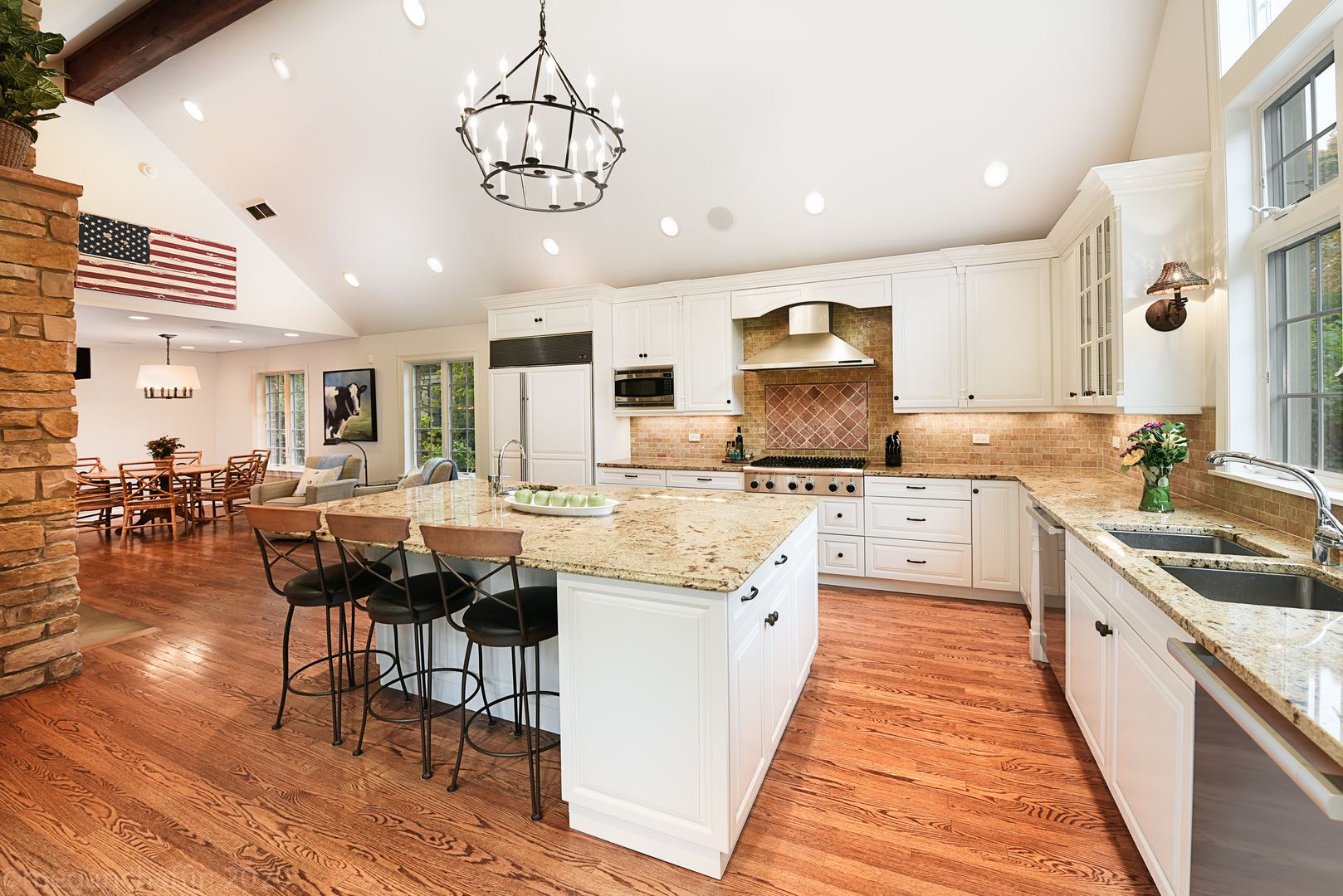 1115 Mohawk Road Wilmette, IL 60091 - Photo 6 of 66 a kitchen with stainless steel appliances kitchen island granite countertop a sink and cabinets