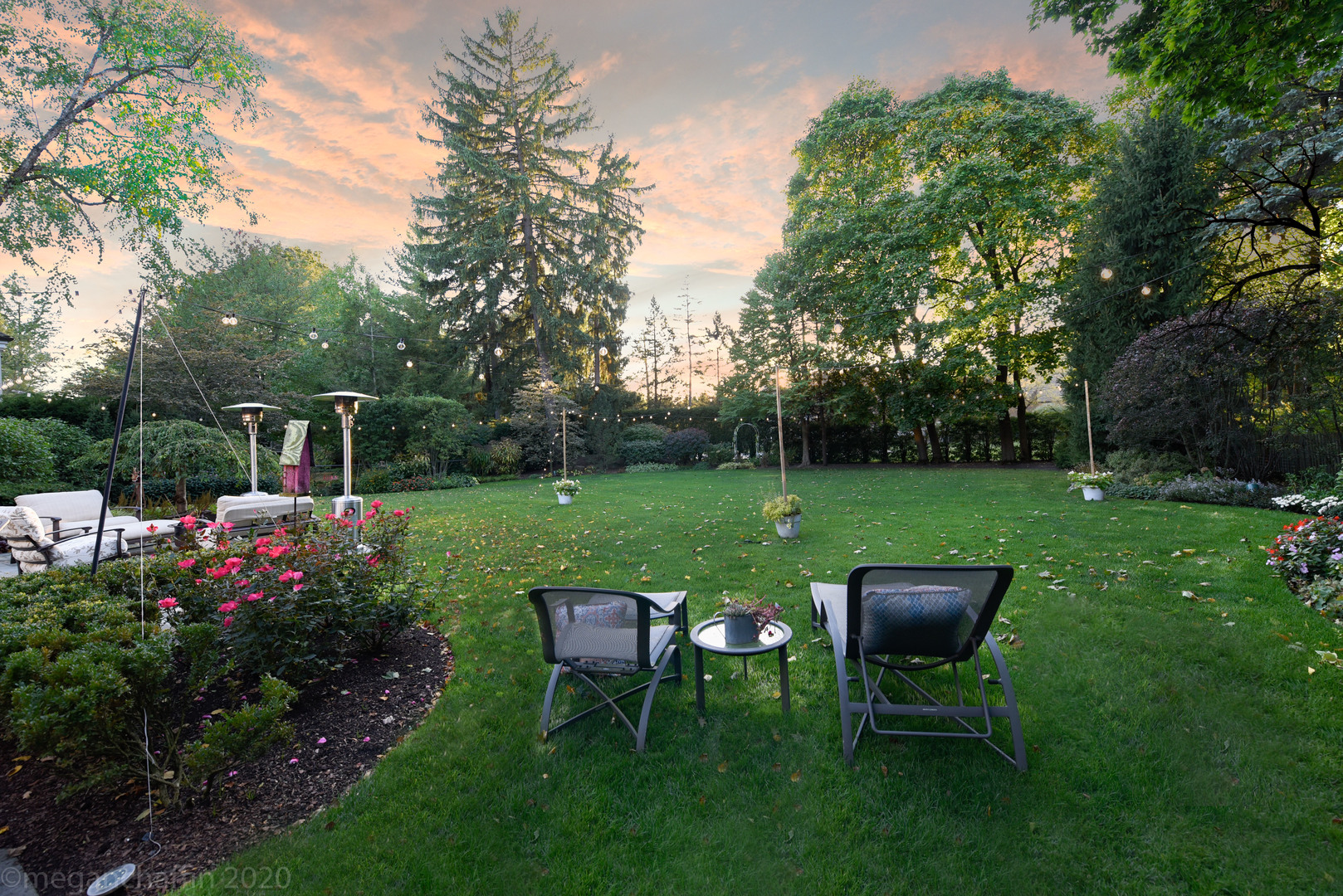 1115 Mohawk Road Wilmette, IL 60091 - Photo 58 of 66 a view of a house with backyard sitting area and garden