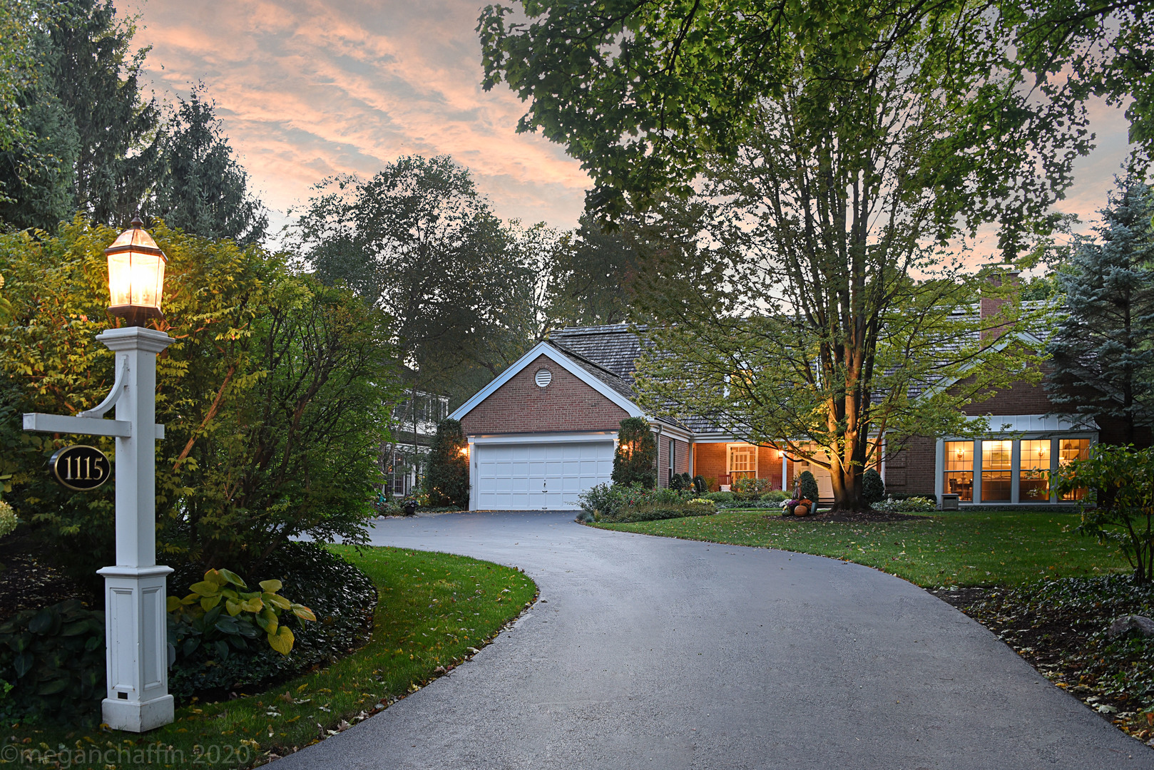 1115 Mohawk Road Wilmette, IL 60091 - Photo 62 of 66 a front view of a house with garden