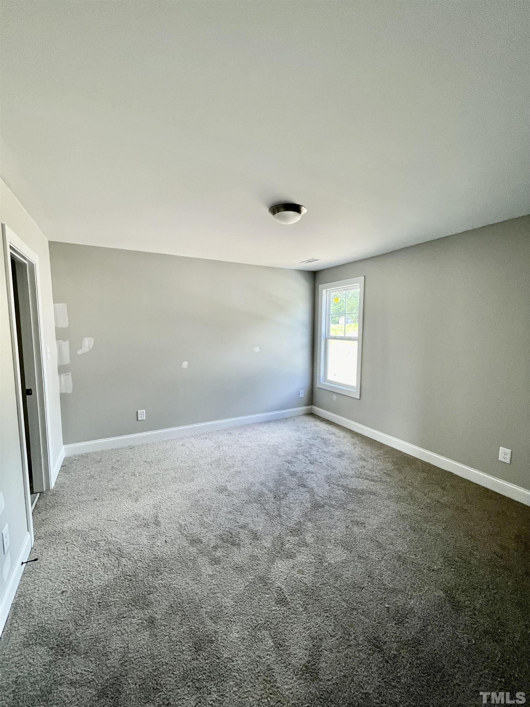 1428 Old Watkins Road Raleigh, NC 27616 - Photo 26 of 36 an empty room with window