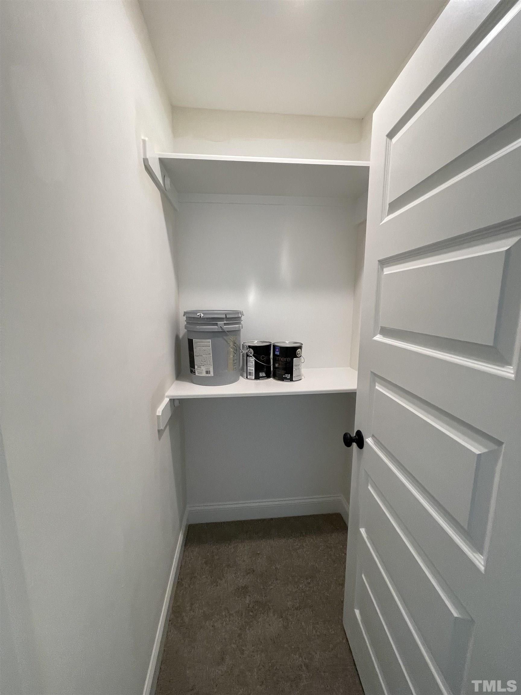 1428 Old Watkins Road Raleigh, NC 27616 - Photo 32 of 36 a view of storage and utility room with washer and dryer