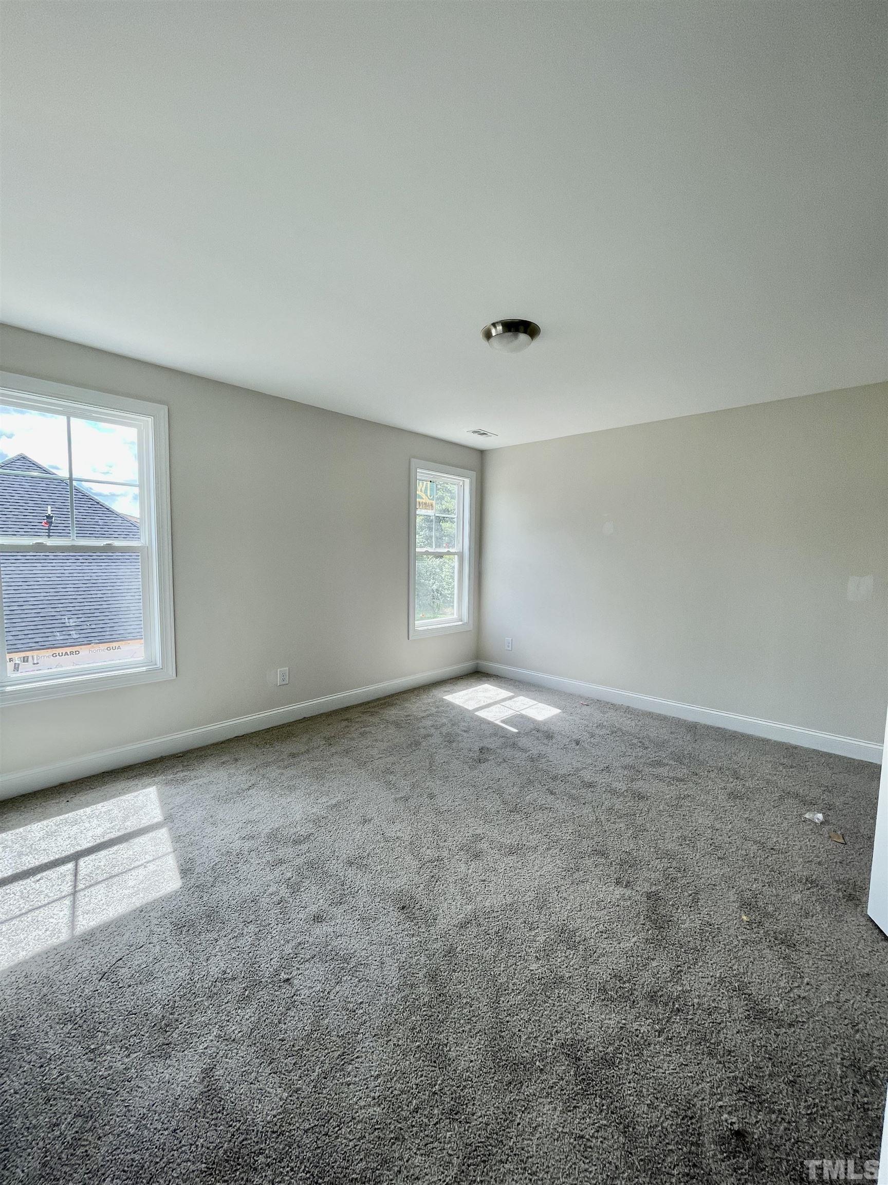 1428 Old Watkins Road Raleigh, NC 27616 - Photo 34 of 36 a view of an empty room and window