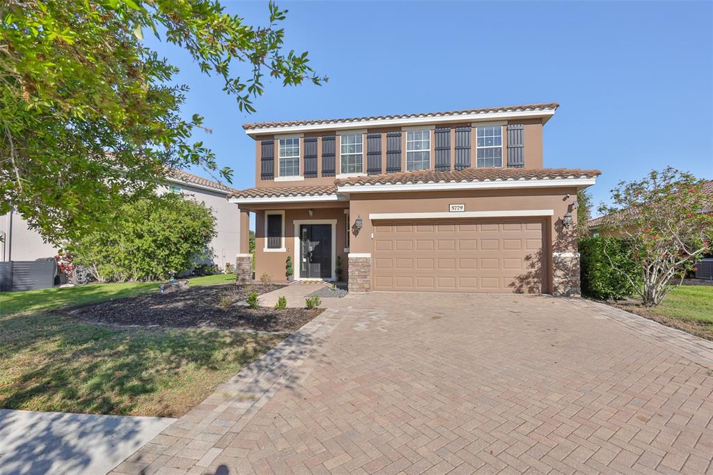 front view of house with a yard