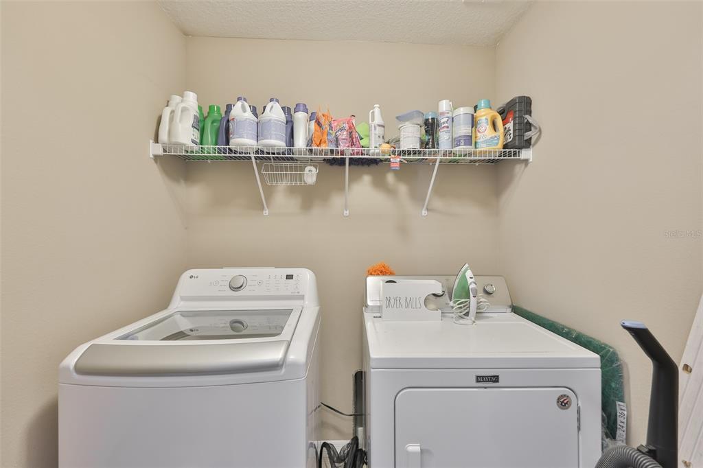 5779 Aaron Court Sarasota, FL 34232 - Photo 27 of 39 a utility room with dryer and washer